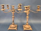 pair of antique brass candelabs on stands