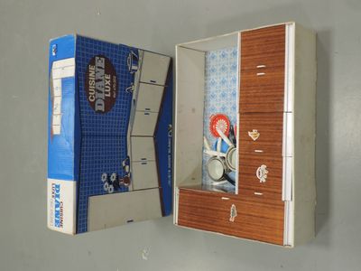 a box with a clock inside of it on the wall