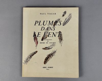 un livre sur lequel figure un dessin représentant des plumes volant dans les airs