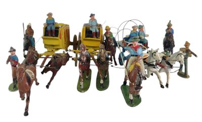 de nombreuses figurines représentant des personnes voyageant dans une calèche