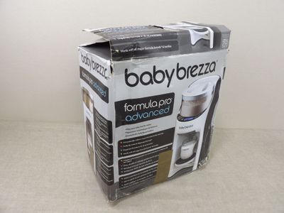 packaging of a baby brezza coffee maker sitting on a table