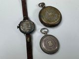 three different types of watches are displayed on a white surface