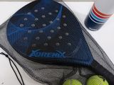 two tennis balls in a mesh bag and a bottle of water