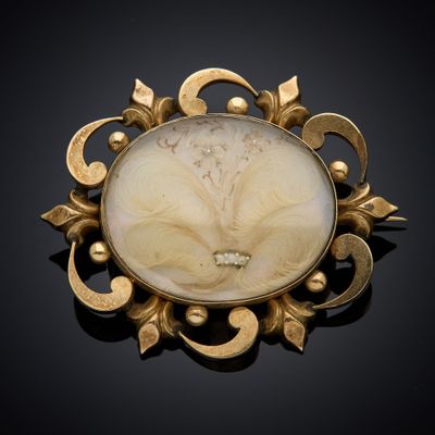 une image représentant une broche ornée d'un motif floral