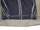 a jacket that has a zipper on the back of it
