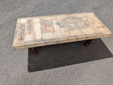a coffee table made out of pallet wood with a design on it