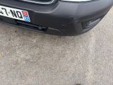 a picture of a car that is parked in a lot
