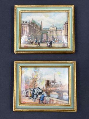 deux tableaux encadrés représentant des personnes sur un pont et un bâtiment