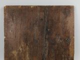 a close up of a piece of wood on a white surface