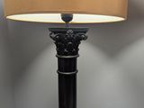 an image of a lamp that is on a table in a room