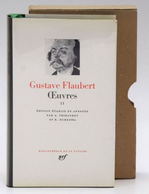 an old book with a picture of a man smoking a cigarette
