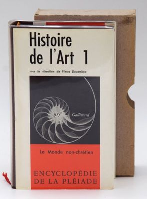 an image of a book sitting on top of a table next to a box