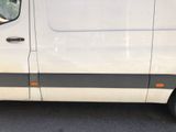 a white van parked on the side of the road