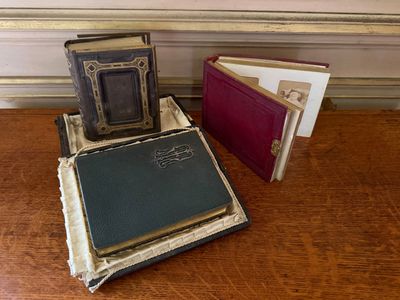 three books sitting on a table next to each other