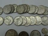 a close up of a bunch of coins on a table