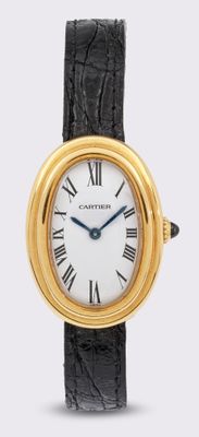 une image d'un gros plan d'une montre-bracelet avec des chiffres romains