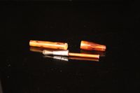 Présentoir à 24 fines cigarettes dans une boîte en métal. (photo 4)