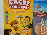 two books on the table and a game on the table