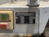 a close up of a machine with a lot of buttons on it