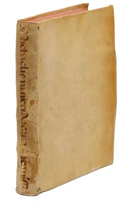 an old book sitting on top of a white surface next to a white background