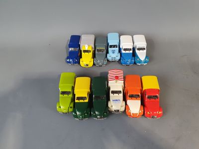 a lot of toy cars that are sitting on a table