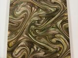 a close up of a piece of art that is on a table