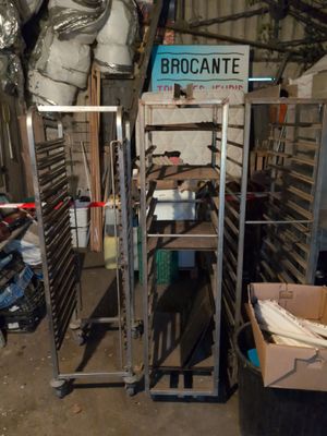 a metal rack with a sign that says brocante on it