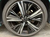 a close up view of a car ' s wheel and tire