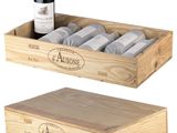 two wooden boxes with bottles of wine and a bottle of wine in them