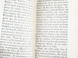 an open book with a black and white picture on it