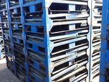 a lot of pallets that are stacked up together