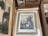 deux photos encadrées d'un homme et d'une femme sur une table