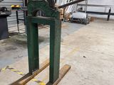 a large machine that is sitting in a garage