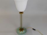 an image of a table lamp with a white glass shade on it