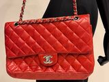a red chanel bag on a mannequin mannequin mannequin mannequin mannequin mannequin mannequin mannequin mann