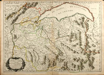 an old map of the country of france with mountains in the background
