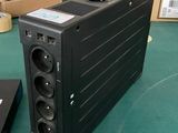 two speakers sitting on a table next to each other