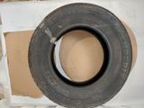 a tire that is sitting on top of a box