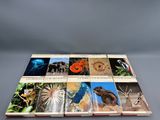 an open book with pictures of animals and plants on it