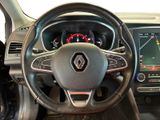 the interior of a car with a steering wheel and dashboard controls