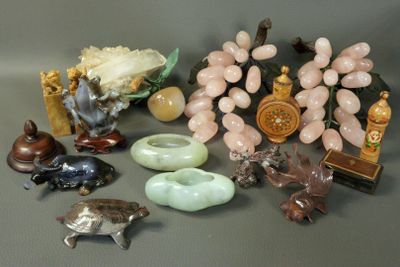 a lot of figurines that are sitting on a table