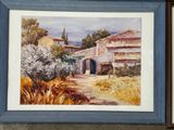 painting of a house in a rural setting with a blue frame