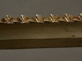 a close up of a blade of a large metal blade
