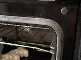 an oven with some food cooking inside of it