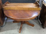 a wooden table with a wooden tray on top of it
