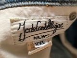 an image of a close up of a label on a pair of jeans