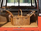a wicker basket in the back of a red van