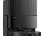 the coffee maker is black and has a black base