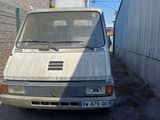 a white van that is parked on the side of the road