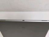 a close up of the back of a tablet computer on a table